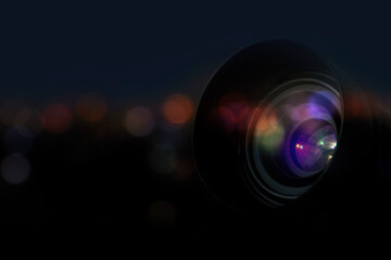 Camera lens reflections on blur night city background