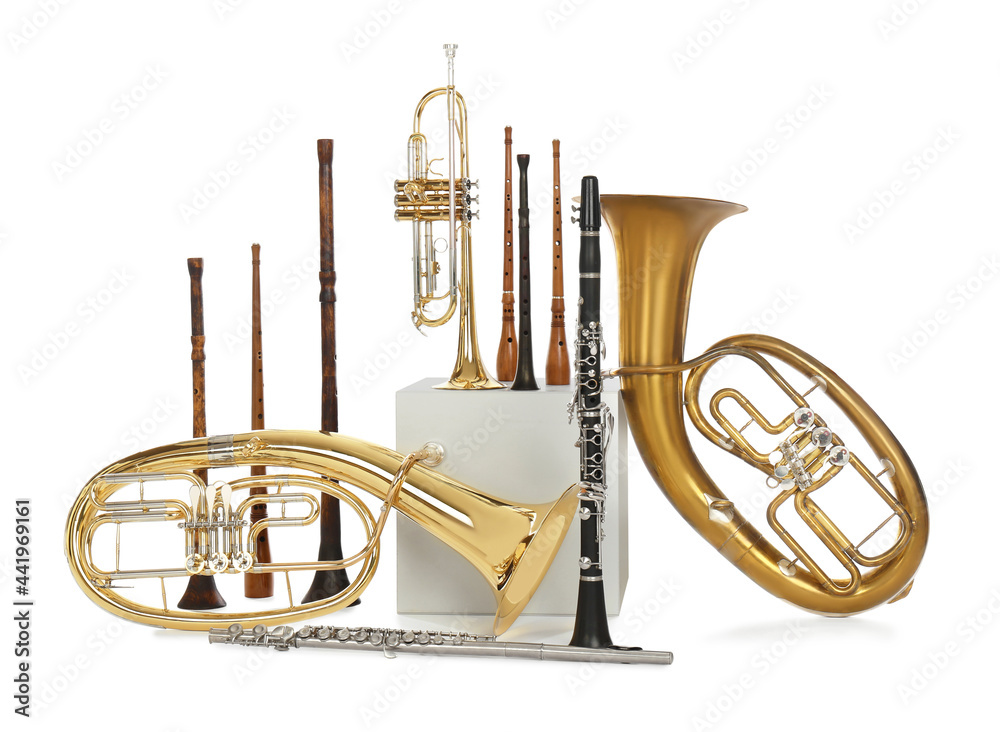 Wall mural Set of wind musical instruments on white background