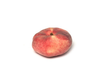 Closeup of flat peach on white background