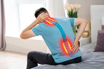 Lumbar and cervical spine hernia, man with back pain at home, compression injury of the...