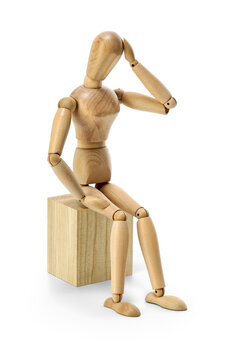 wooden mannequin expressing depression