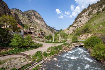 Fototapeta na wymiar Fiagdon River, at the foot of Mount Kariu-khokh. Dzivgis. Alagir district. North Ossetia. Russia