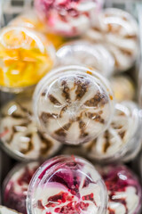 Ice cream products put up for sale in a commercial refrigerator