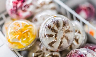 Ice cream products put up for sale in a commercial refrigerator