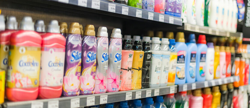 Bottles of liquid fabric softeners in a supermarket