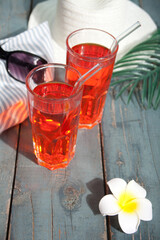Summer refreshing drink cocktail on the wooden background