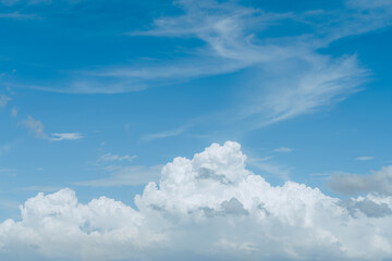 Naklejka na ściany i meble Blue cloudy sky on sunny day with copy space