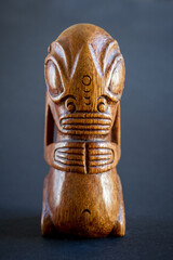 traditional wooden Polynesian tiki from Marquesas Islands