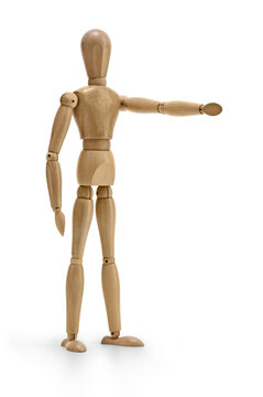 wooden mannequin indicating a direction