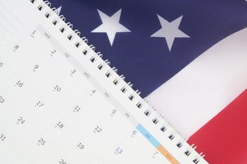 Scheduler, holidays and main dates in United states concept. Calendar on USA flag.