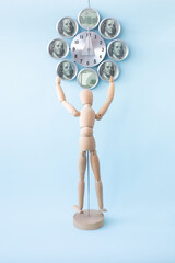 Wooden man praying for money. Wishing the best. Concept.