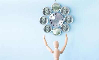 Wooden man praying for money. Wishing the best. Concept.