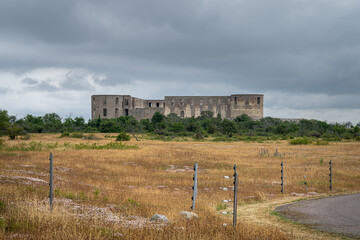 An old castle with a dramatic sky in the background. Borgholm castle ruins on the Baltic Sea island Oland