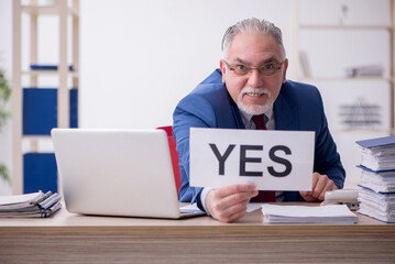 Old male employee and too much work in the office