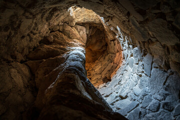 Old antique stone spiral staircase to belfry