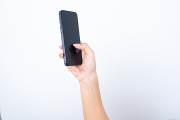 woman's hand with pink manicure isolated over white background, holding a mobile phone. Modern technologies concept. 