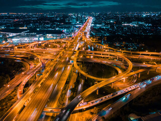 Fototapeta na wymiar Of traffic on city streets at night. Aerial view and top view of traffic on freeway.