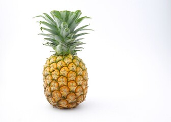 fresh yellow pineapple isolated on white background