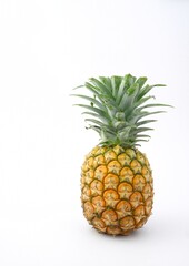 fresh yellow pineapple isolated on white background