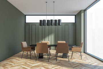 Moss green meeting room with table on light brown parquet