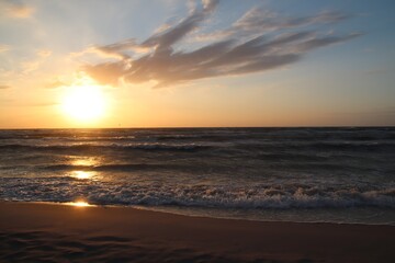 Obraz na płótnie Canvas Zachód słońca na plaży w Łebie 
