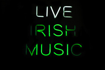 Isolated green neon sign for live irish music