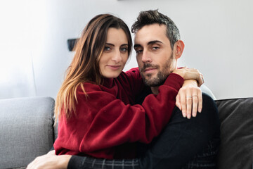 Obraz premium Young couple on the sofa in love