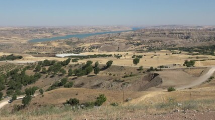 Karadag mountain, Adiyaman, Turkey - 17th of June 2021: 4K Panoramic view on the Adiyaman district from the Karakus kurgan, panning
