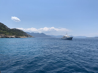 ship in the sea in Greece near island with blue sky