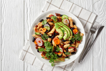 Mexican salad of black beans, chicken, and radish