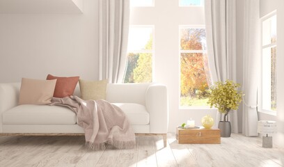 Fototapeta na wymiar Stylish room in white color with sofa and autumn landscape in window. Scandinavian interior design. 3D illustration