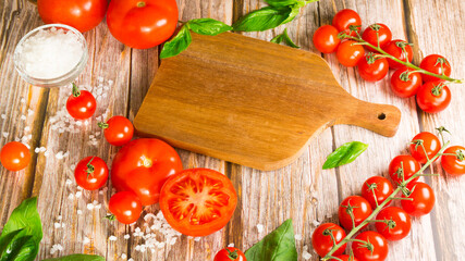 Many different tomatoes on the table