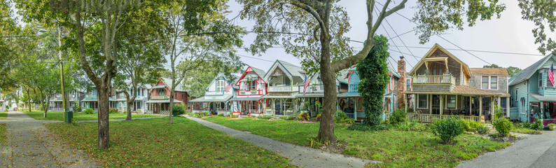 Carpenters Cottages called gingerbread houses  on Lake Avenue, Oak Bluffs on Martha's Vineyard, Massachusetts, USA - obrazy, fototapety, plakaty