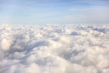Fototapeta na wymiar over the clouds with blue sky