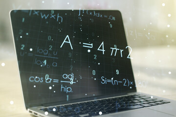 Creative scientific formula hologram on modern laptop background, research concept. Multiexposure