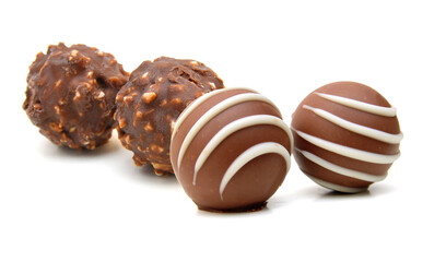 Chocolate candies collection. Beautiful Belgian truffles isolated on white background