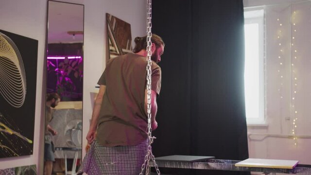 An adult painter is starting to create a new picture