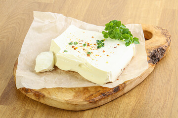 Greek Feta cheese over board