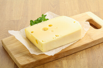 Maasdam cheese over the board