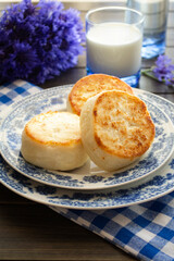 Cottage cheese pancakes with blue cornflower, breakfast or lunch