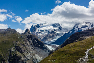 Fototapeta na wymiar Panorama of cloud layer from mountain top over Swiss alps