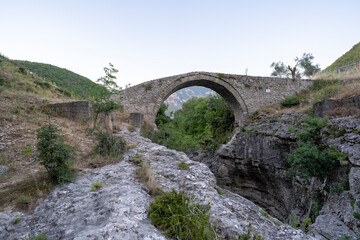 Fototapeta na wymiar Tirana river canyon and old stone bridge of Brarri
