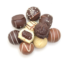 Chocolate candies collection. Beautiful Belgian truffles isolated on white background