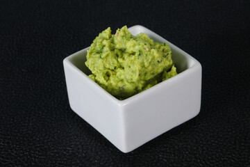 Avocado guacamole sauce with chili pepper