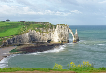 View of the famous Alabaster Coast cliffs at Etretat in Normandy, France - 442016352