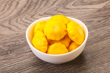 Marinated patissons in the bowl