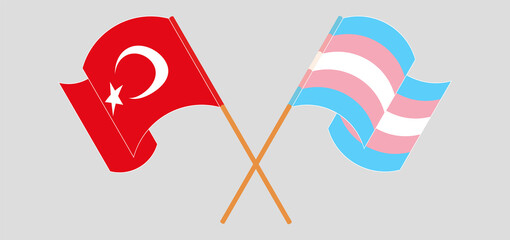 Crossed and waving flags of Turkey and transgender pride