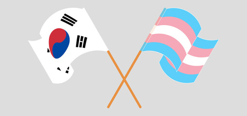 Crossed and waving flags of South Korea and transgender pride