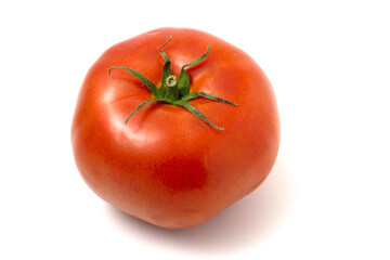 One fresh red tomato isolated on white