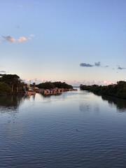 Obraz premium sunset over the river